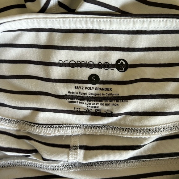 Scorpio Sol Luxury Performance Crop
Size S White Black Stripe - Picture 5 of 9